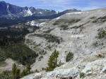E. face of Lion Mt., showing haul road and thrusts in marble, Hecla, MT