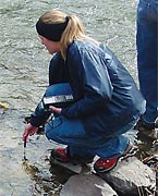 Students at stream flowing into Lago Fagnano, Tierra del Fuego